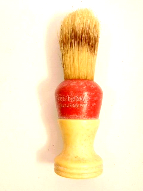 old, pre-owned red & yellowish Ever-Ready Guaranteed shaving brush
