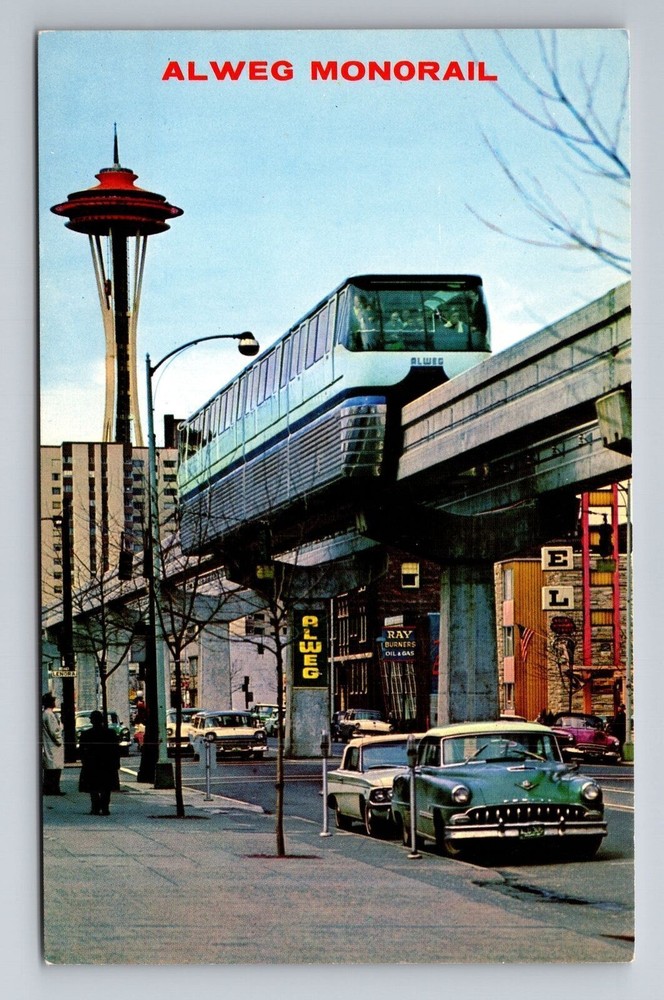 Seattle WA vintage night scene with Monorail and Space Needle postcard
