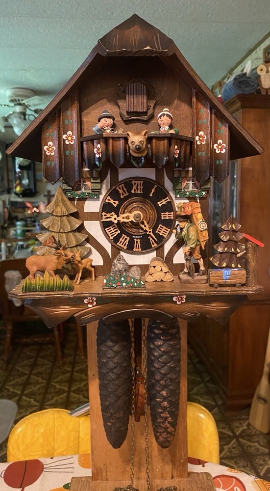 Vintage Chalet 8-Day Cuckoo Clock with Band Members and Peddler-image