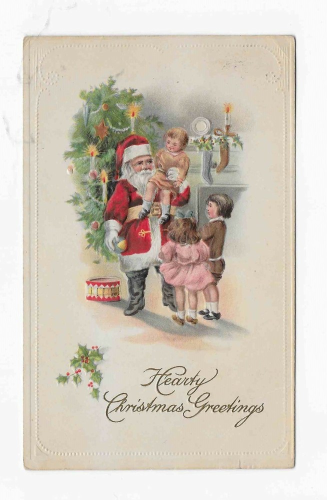 VINTAGE CHRISTMAS POSTCARD * SANTA HOLDING CHILD*CHILDREN*TREE LIT WITH CANDLES