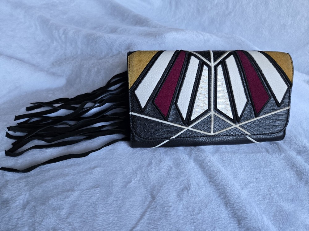 SAM EDELMAN Women’s Multi Leather Clutch for Style and Functionality