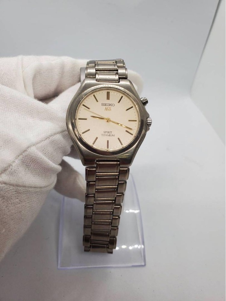 Seiko A2704 4M21-0B50 Stainless Steel Watch with Gold Accents