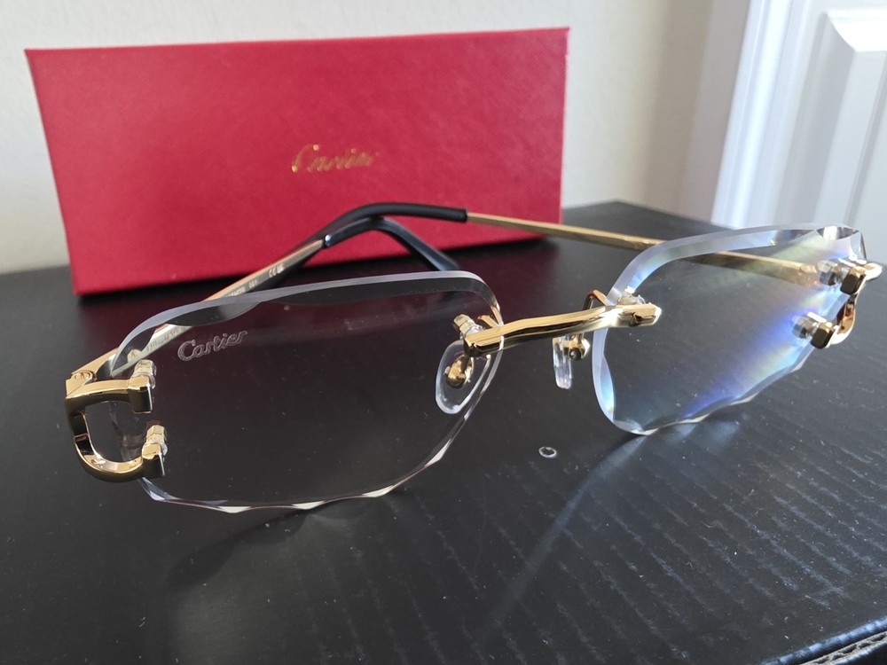 Cartier Gold C-Frame Sunglasses with Clear Oval Lenses