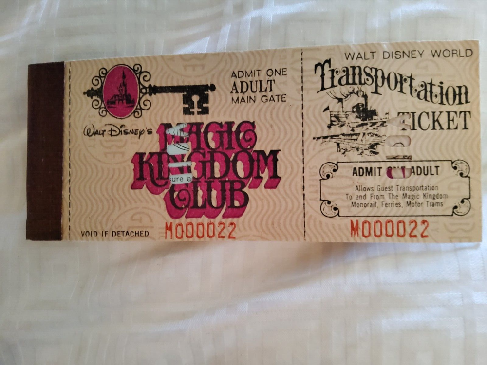 1974 Walt Disney World adult ticket coupon book with vintage 1970s admission and transportation-image