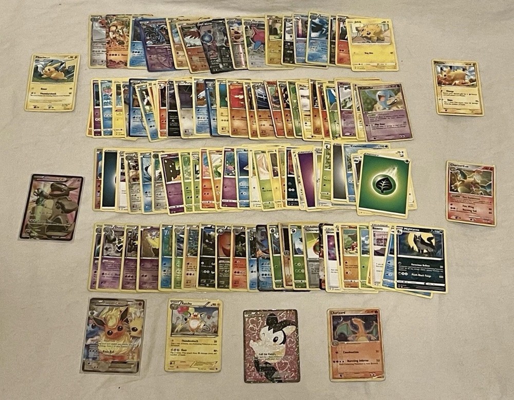 ESTATE FIND Lot of Misc. Well Played Pokemon Cards Charizard Raichu Flareon Holo