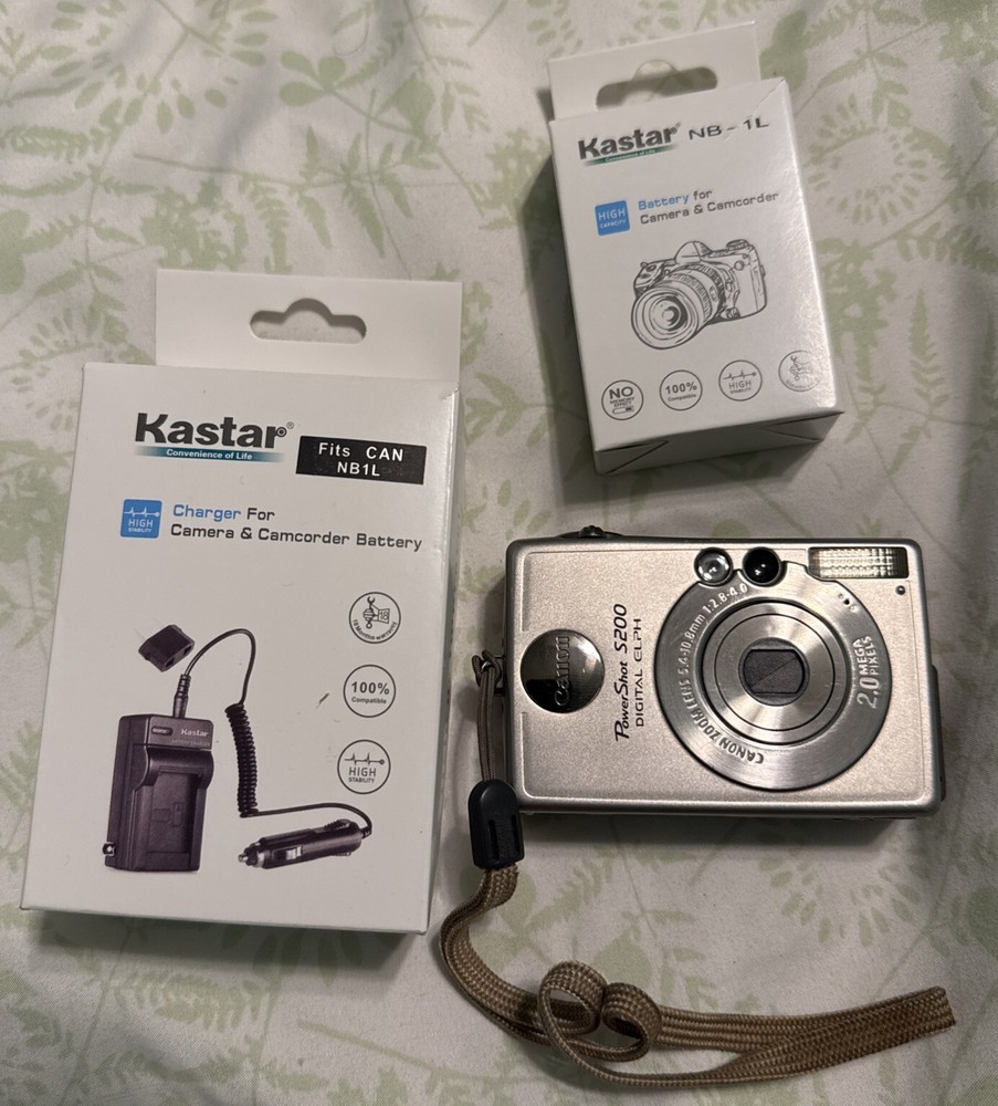 Canon PowerShot Digital ELPH S200 Digital Camera w/ New Battery & Charger EUC