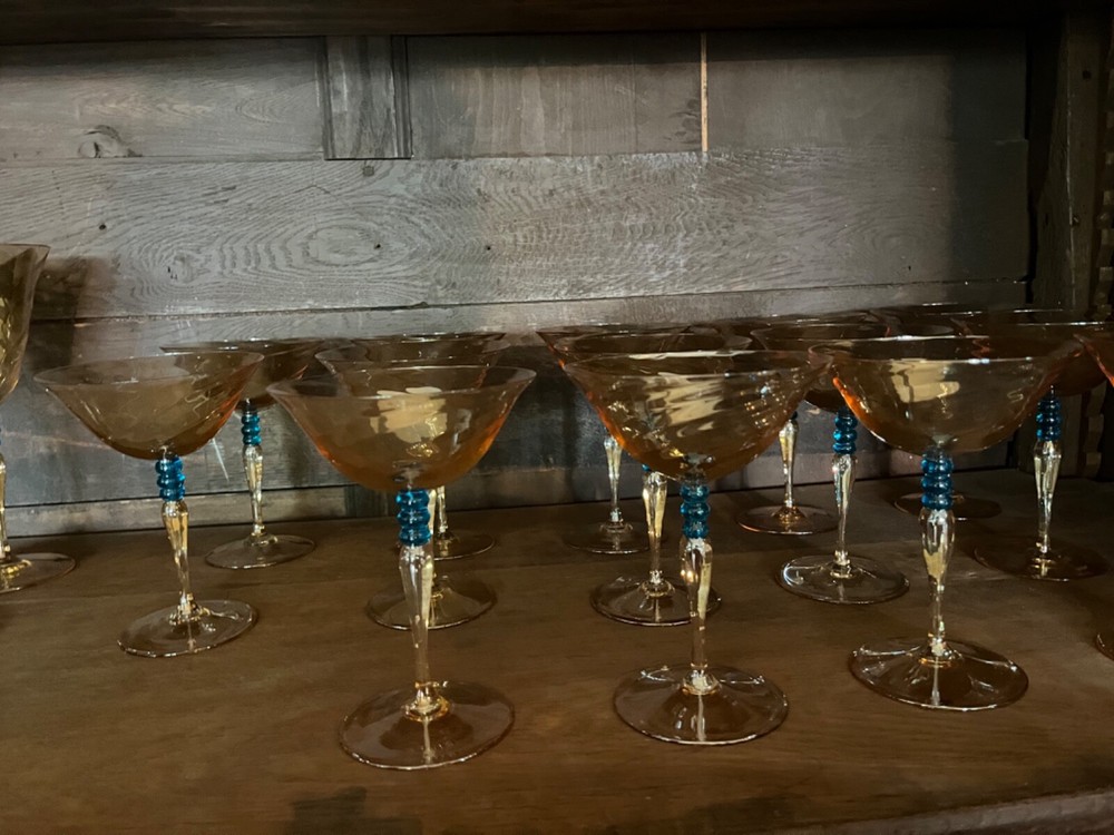 Crystal coupes set of 4 amber swirl with blue stem 6 1/4 inch