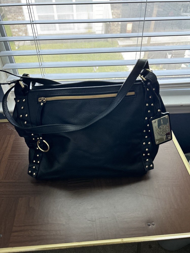 SOLINA Black Studded Leather Handbag with Ornate Emblem Inside Pockets