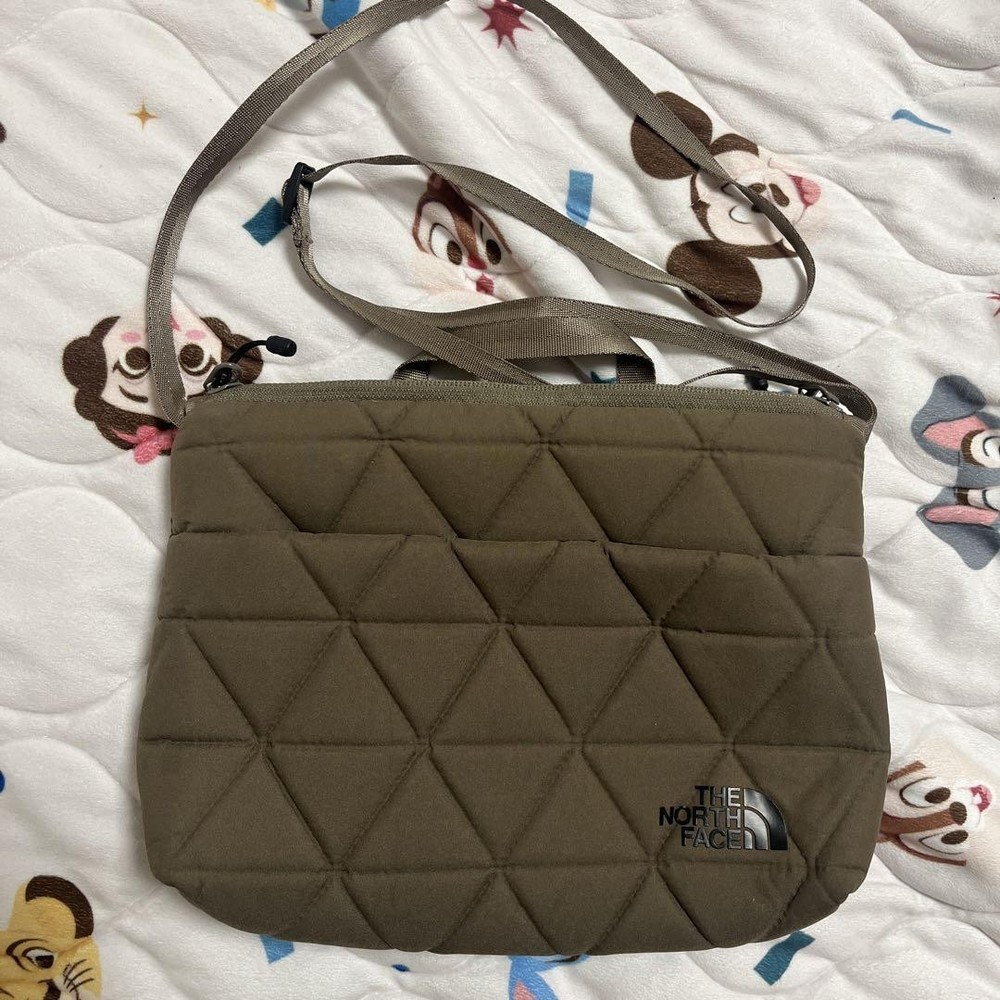 The North Face Geoface Pouch in Walnut - Stylish Durable Easy-Use Pop Design