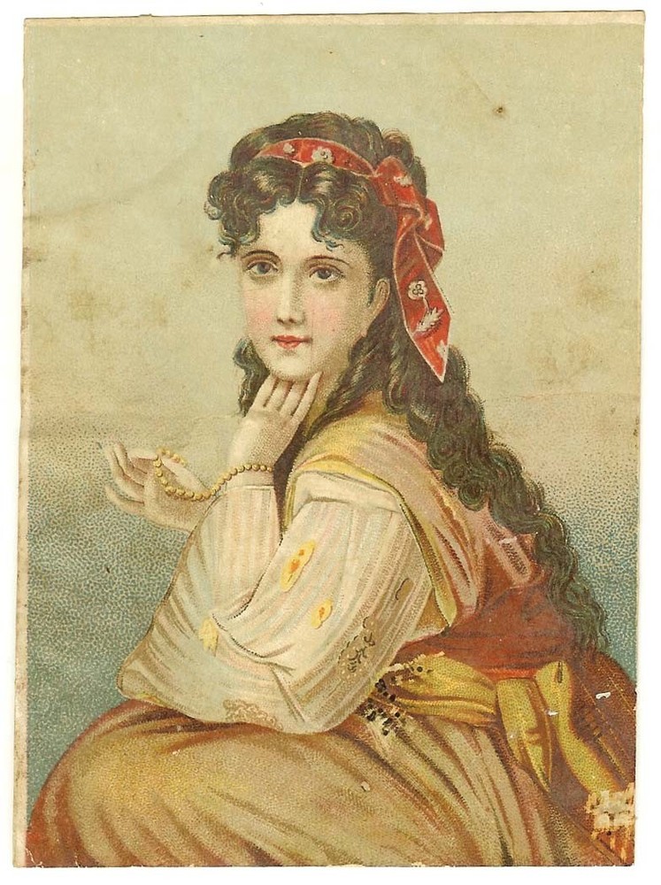 Victorian scrap image of elegant young woman in red scarf and pearls 1880s