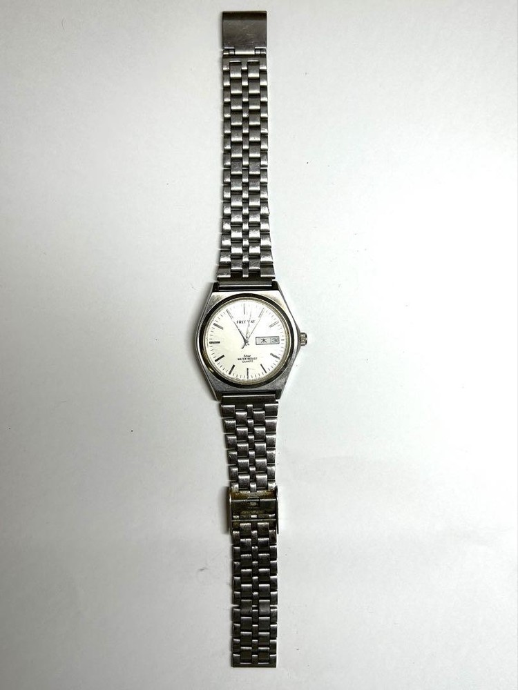Citizen J874 Watch with Sunday Day Display Feature