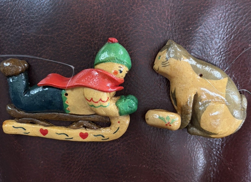 2 VTG Folk Art Salt Dough Ornaments of Boy Sledding + Cat Signed By Artist Edith