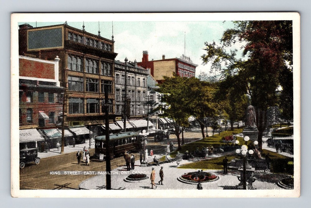 Vintage postcard of Hamilton Canada King Street East town square statue and trolley  