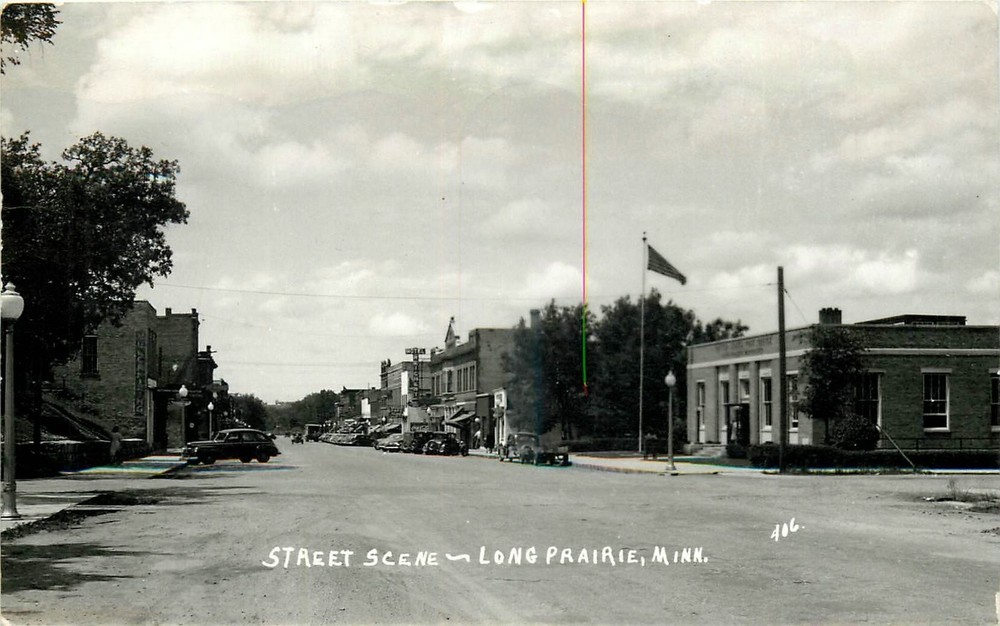 1953 Long Prairie Minnesota Street Scene autos Pearson RPPC Postcard 25-8018