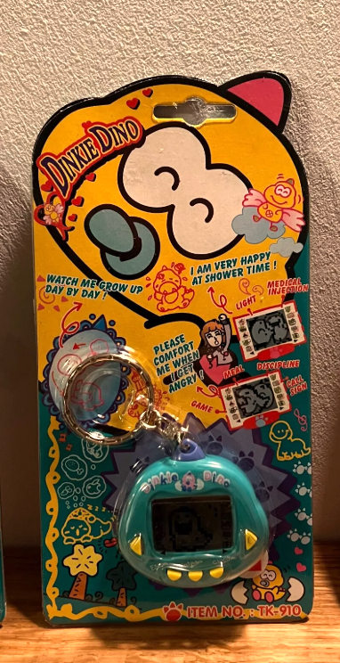 Vintage Green Dinkie Dino Tamagotchi Virtual Pet with Original Packaging