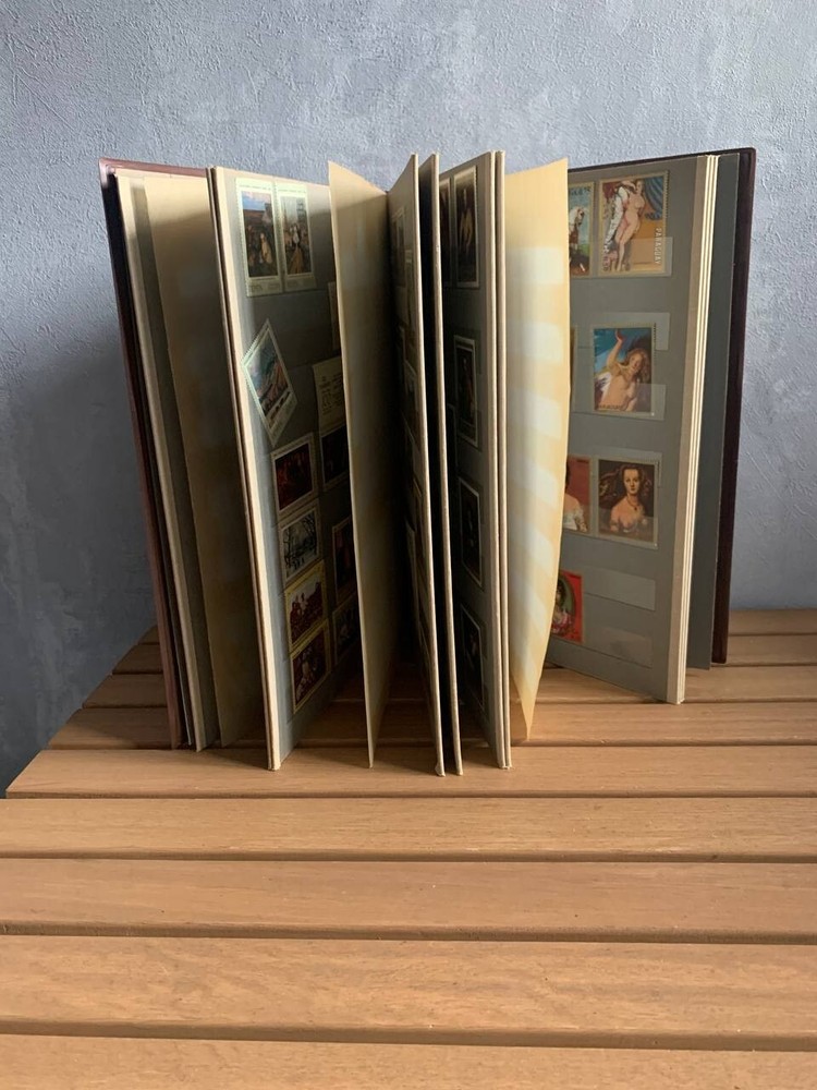 Large Album of stamps of the USSR Paraguay ART over 225 pcs. not canceled