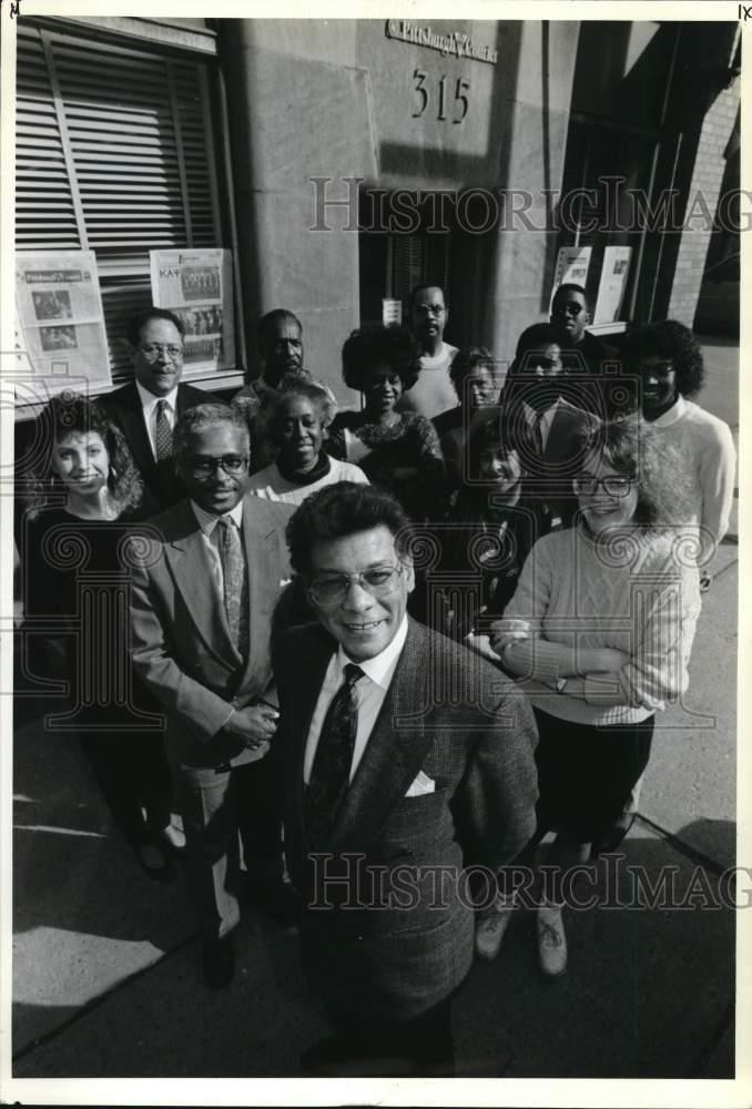 1991 Press Photo Rod Doss poses outside Pittsburgh Courier with newspaper staff