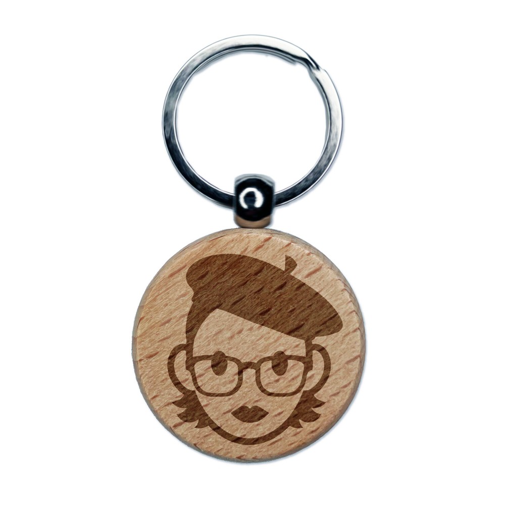 Dije llavero redondo de madera grabado icono artista mujer