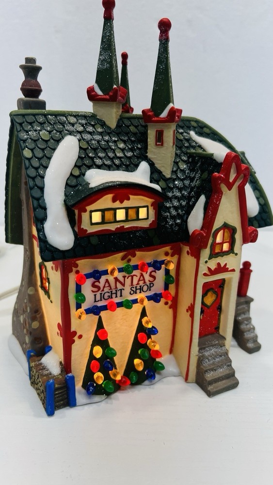 Dept 56 North Pole Series “ Santa’s Light Shop” 56397 Retired Excellent  !