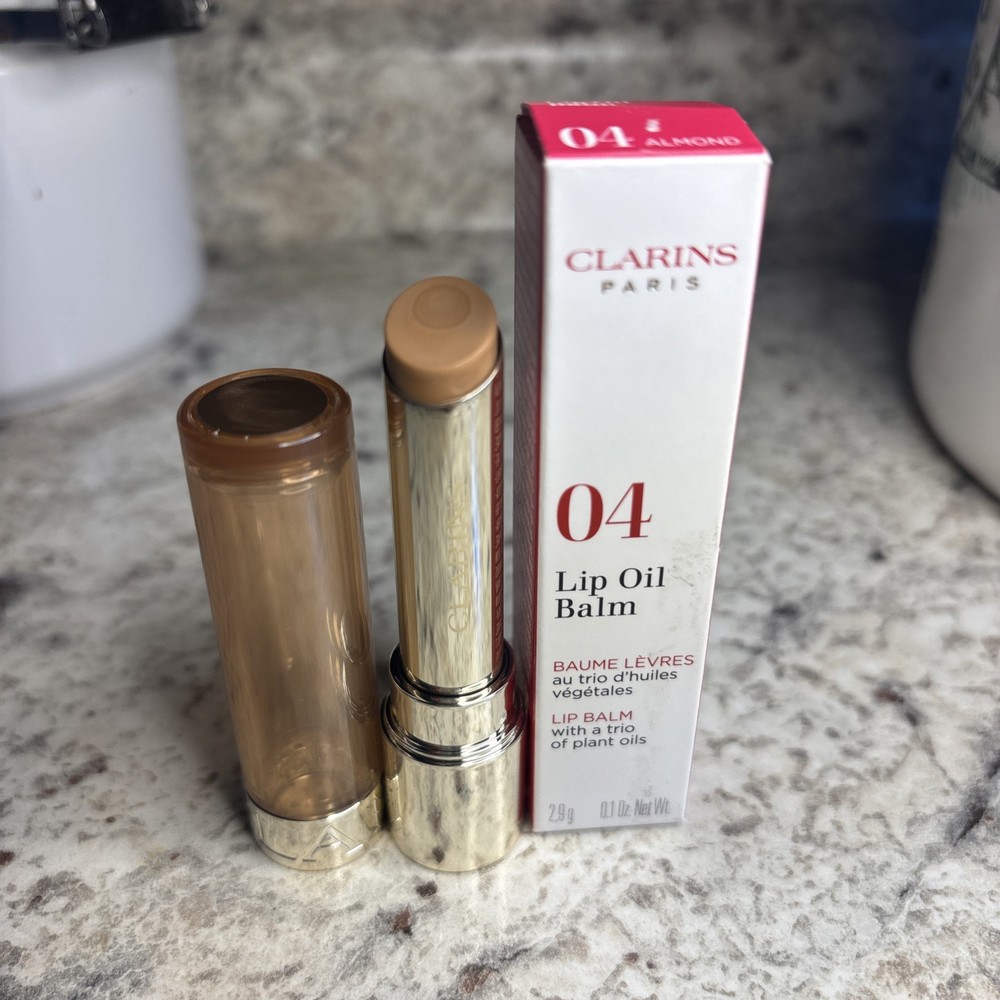 CLARINS LIP OIL BALM WITH A TRIO OF PLANT OILS 2.9 G/0.1 OZ. #04 ALMOND