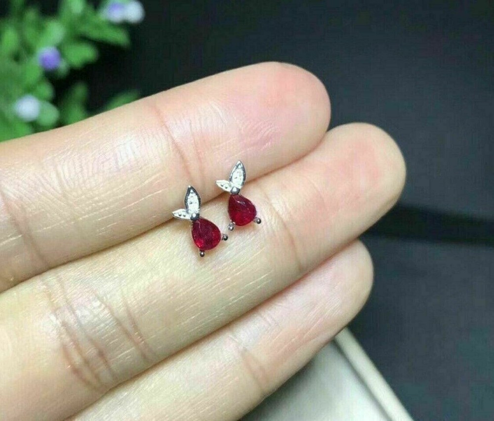 Pear Cut Simulated Red Ruby Elegant Fancy Stud Earrings in 14K White Gold Plating for a Sophisticated Look