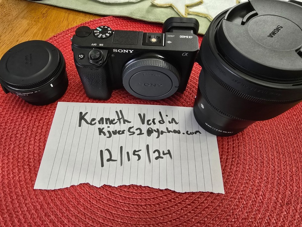 sony a 6400 camera with Sigma 16mm lens used