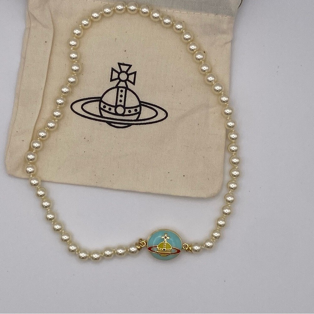 Vivienne Westwood Blue Loelia faux pearl necklace choker with magnetic closure.