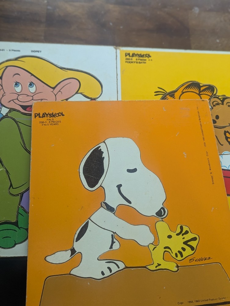 Vintage Peanuts Wooden Puzzles Set Of 3 Snoopy, Garfield, And Snow White Dwarf