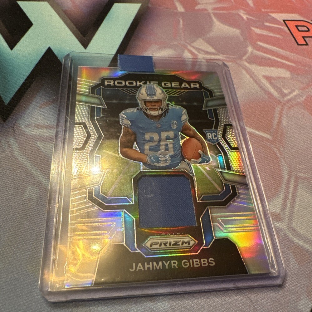 2023 Panini Prizm - Rookie Gear #RG-JG Jahmyr Gibbs (MEM, RC)