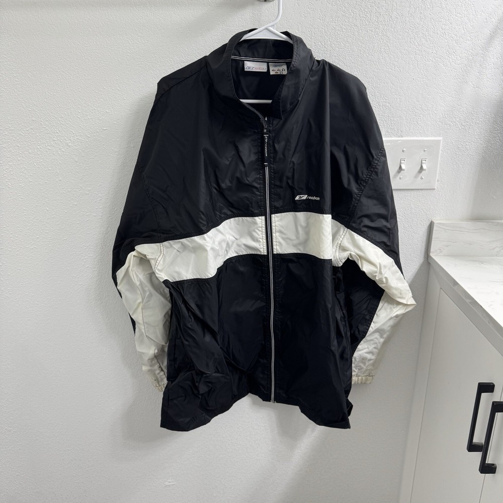 Reebok Zip Up Windbreaker Jacket Zip Pockets Lined Black/White Men’s Size XL