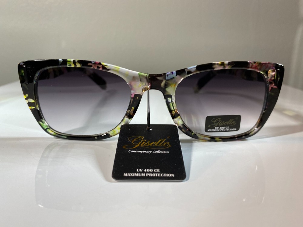 Women's sunglasses with colorful floral pattern frame and purple tinted lenses