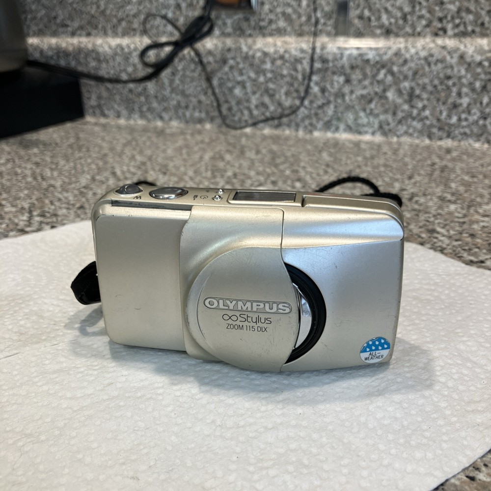 Olympus camera Stylus Zoom 115 DLX  35mm Camera  Tested For  Repair ( Read)
