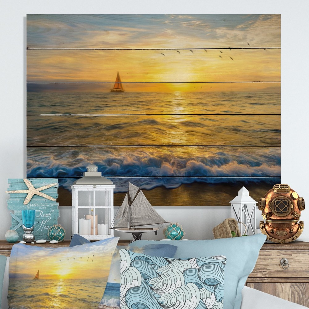 Designart 'Beautiful Sailboat At The Sunset' Nautical & Coastal Wood Wall Art