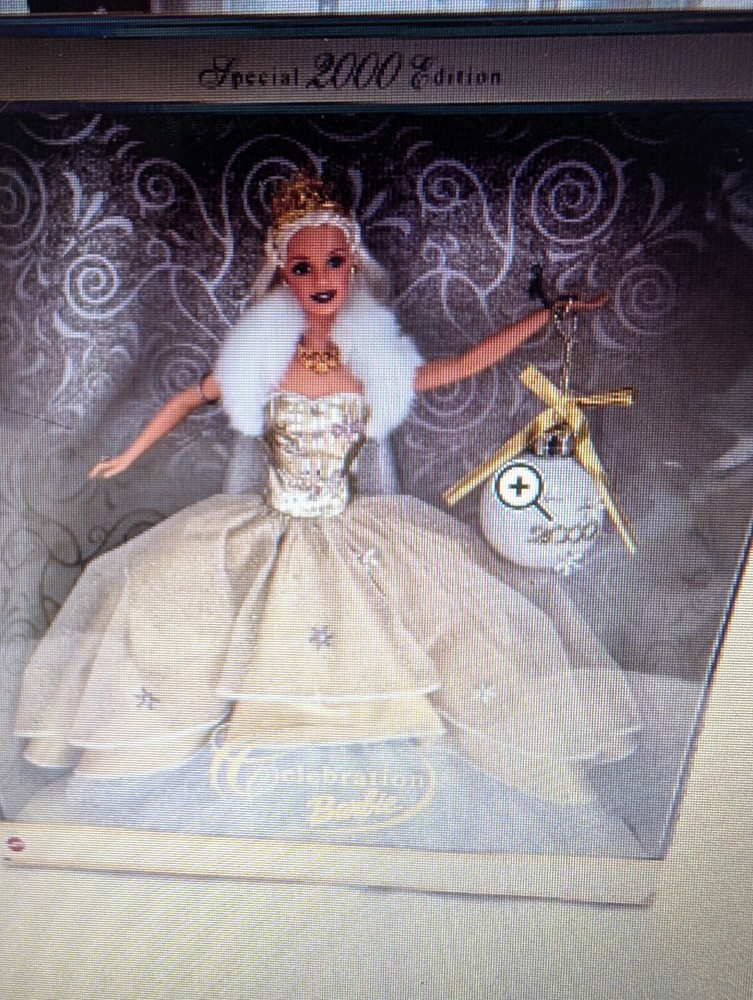 Special 2000 edition celebration barbie 28269.  NEVER OPENED!!
