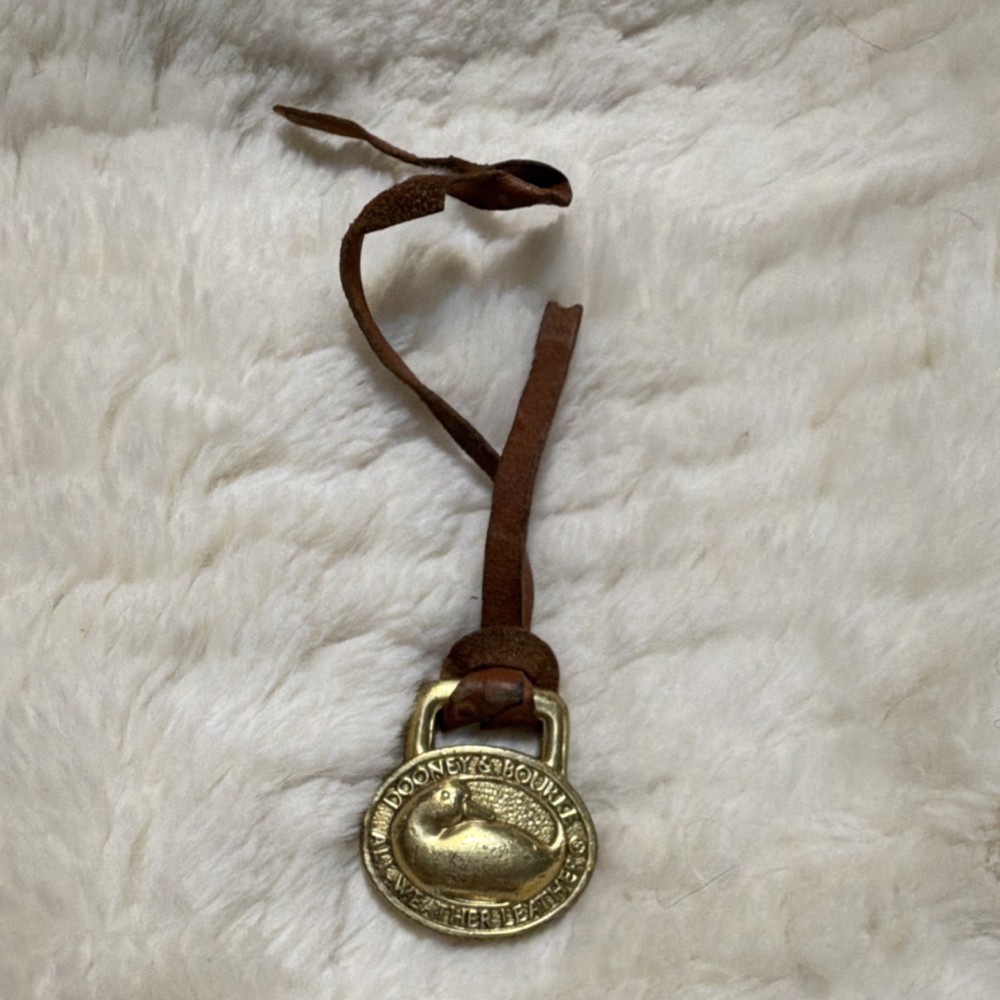 Dooney & Bourke Logo Charm Brown Gold Handbag Accessory for Women