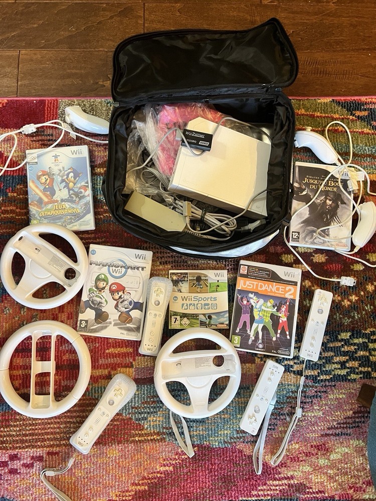 Wii Console Model NO. RVL-001 (eur) With Games, Remotes and Mario Kart Wheels