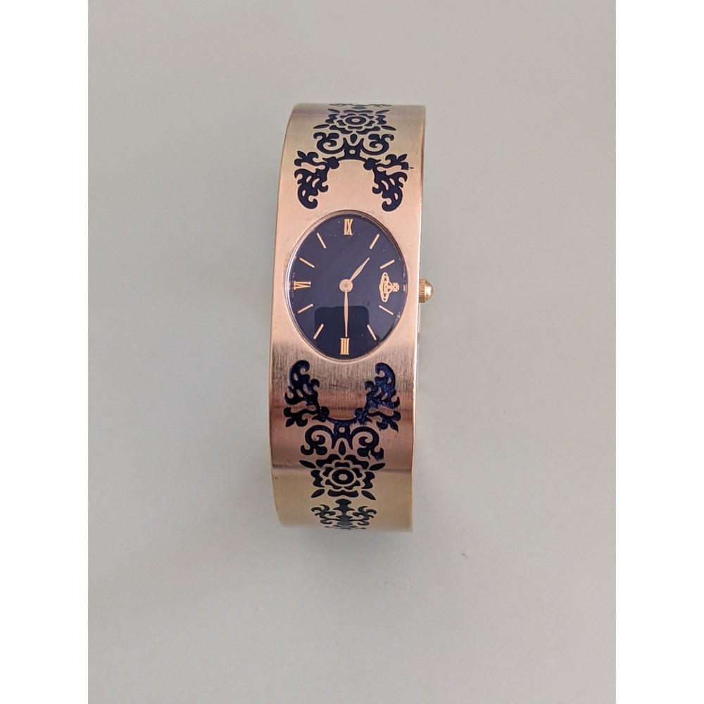 FLAW Preowned Vivienne Westwood Gold Tone Bangle Watch with Etchings 6.5in