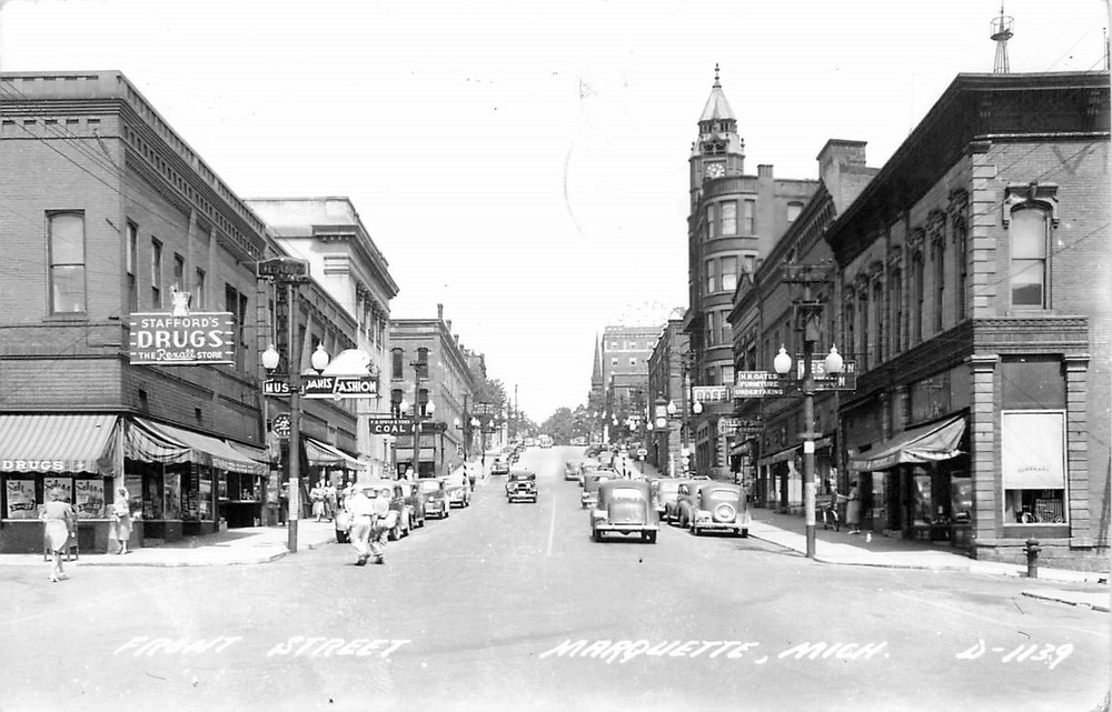 1947 Marquette Michigan Front Street autos people Cook RPPC Postcard 25-9528