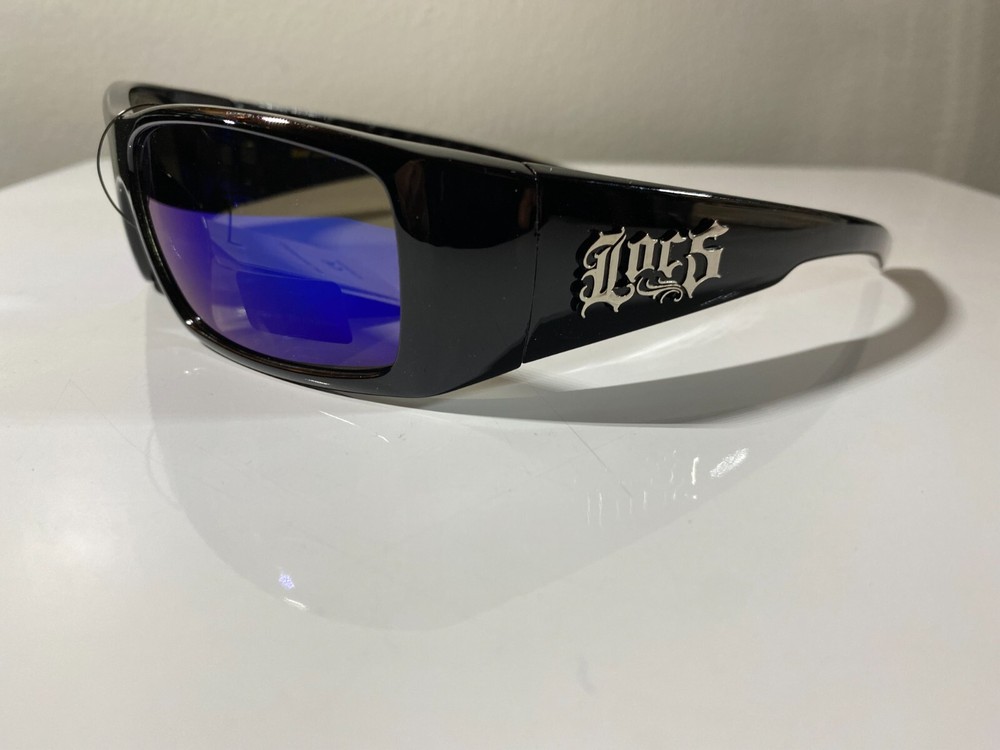 Men's black frame wrap sunglasses with purple reflective lenses