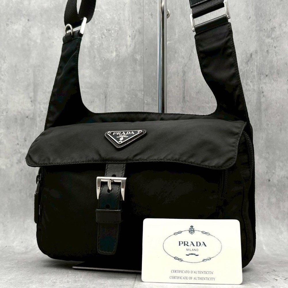 Prada Black Triangle Logo Shoulder Bag with Magnetic Flap and Dual Compartments