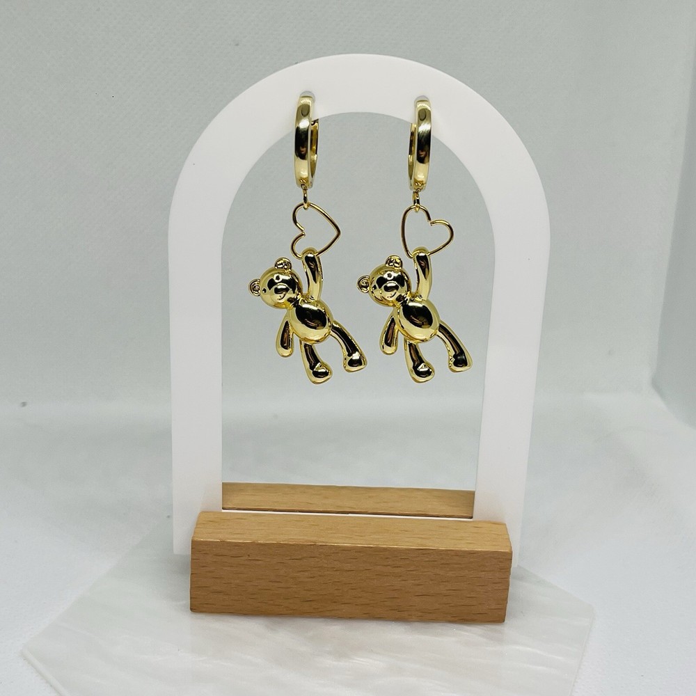 Gold plated hoops with teddy bear charm