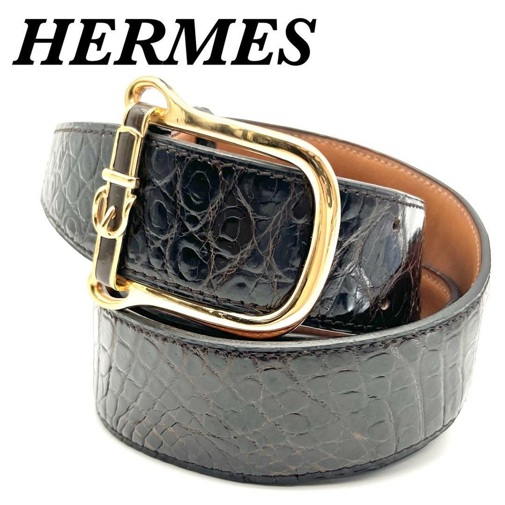 Exclusive Hermes crocodile belt in black and brown with metal fittings