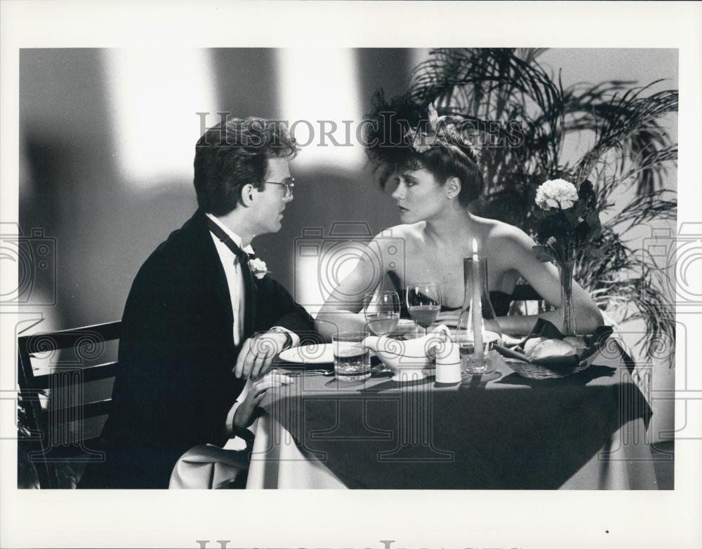 Press Photo A man and a woman having romantic candlelit dinner - DFPG04331