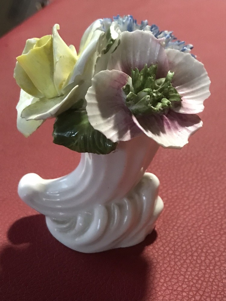 Delicate Porcelain Figurine with Handcrafted Flowers Elegance