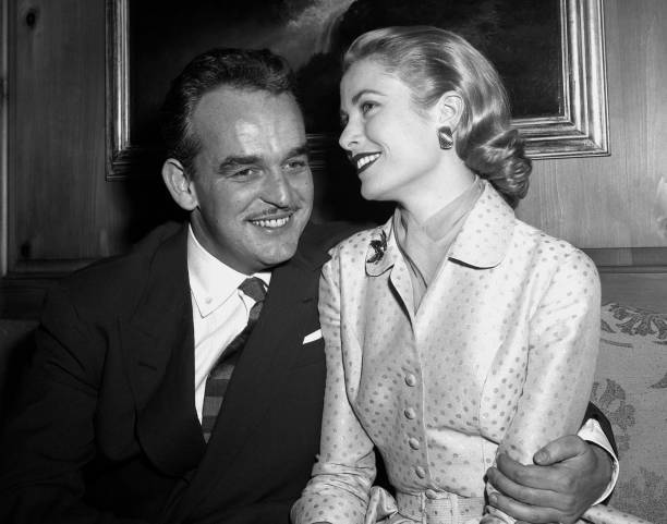 Prince Rainier III of Monaco and Grace Kelly pose for photographer .. Old Photo