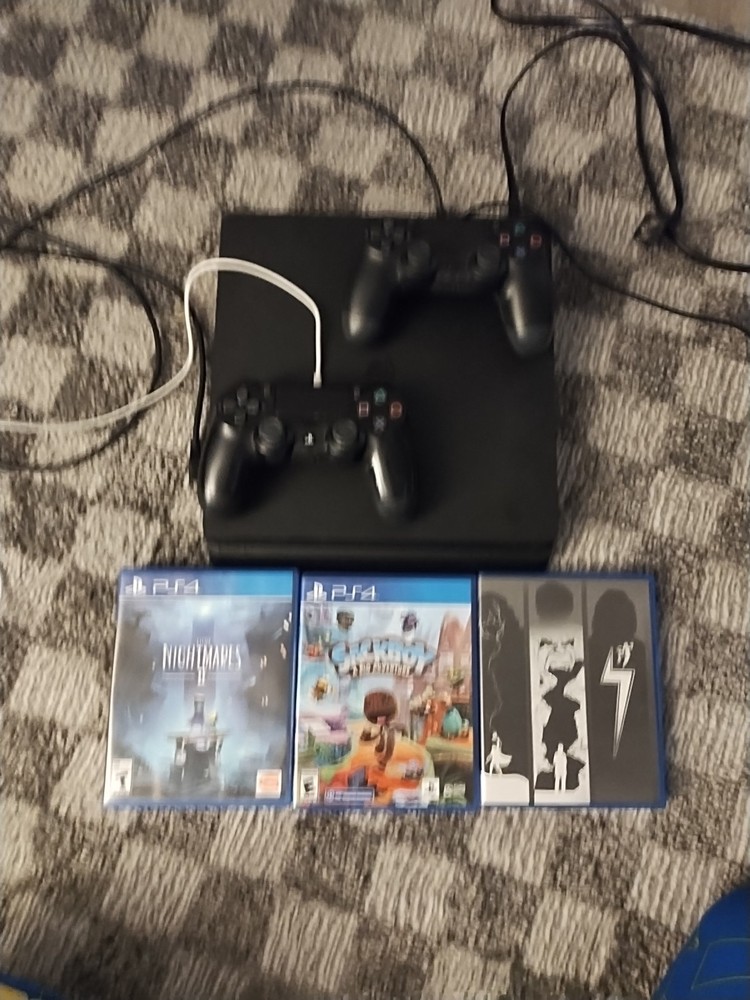 PS4 Slim 1TB Console with Exclusive Mega Bundle Offer