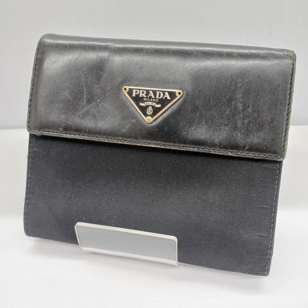 Prada Black Bifold Wallet Pre-Owned Condition Considered No Guarantee