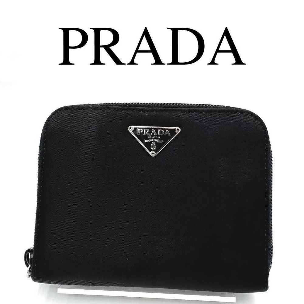 Prada Saffiano leather folding wallet with logo plate
