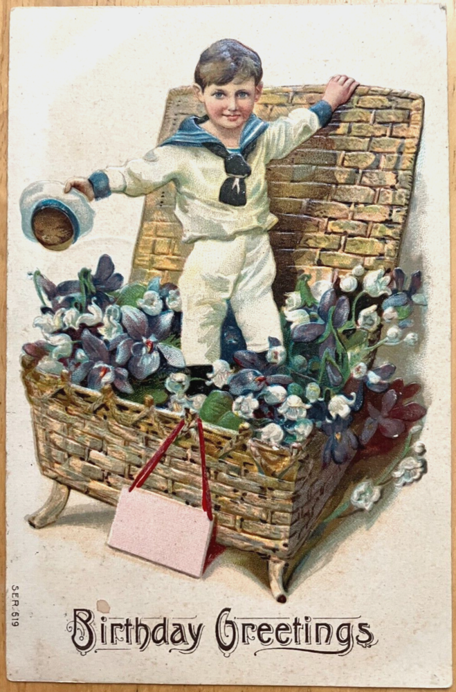 Antique postcard: Birthday Greetings, Boy in basket of lillies-valley, posted