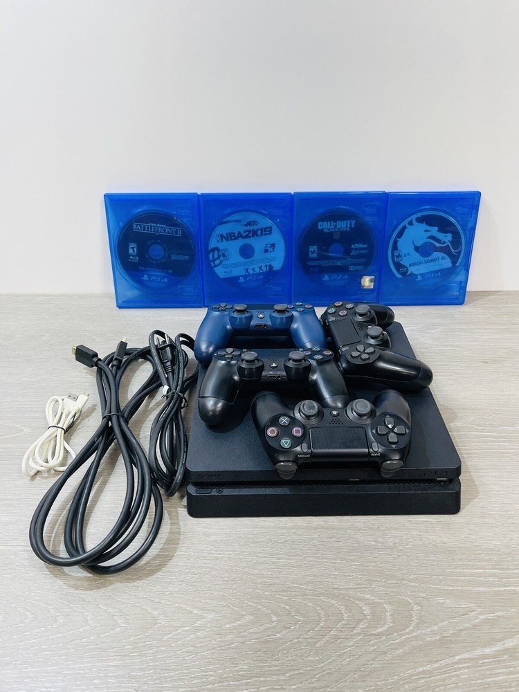Sony PlayStation 4 Slim (PS4 Slim) 1TB CUH-2215B Games 4 Controllers